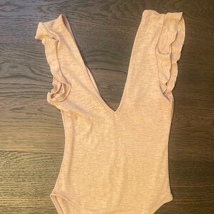 Beautiful Out From Under ( Urban Outfitters) bodysuit in a blush color